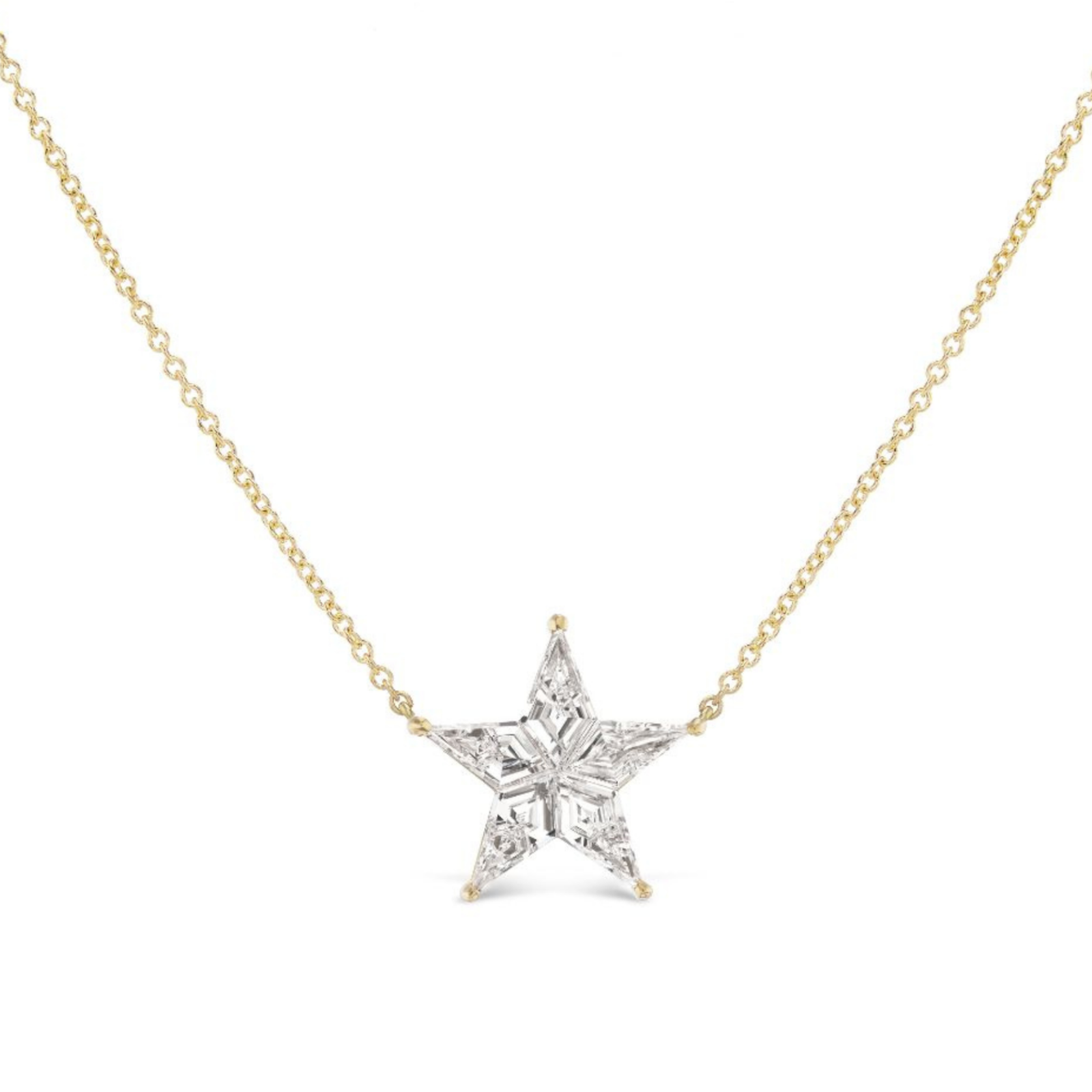 The Celestial Star Diamond Pendant shines at the center of this delicate 18K gold chain necklace.