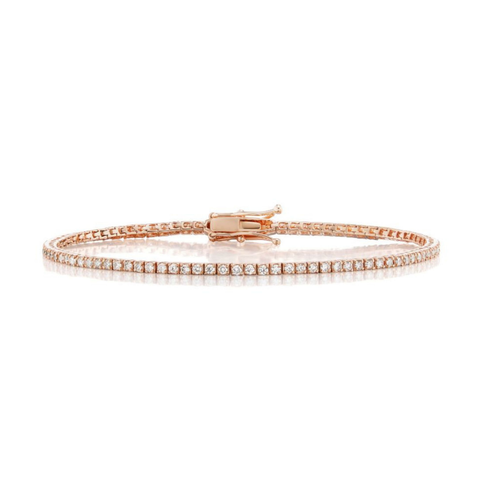 The Skinny Round Brilliant Diamond Tennis Bracelet features a row of sparkling diamonds set in delicate rose gold, secured with a clasp and beautifully displayed against a white background.