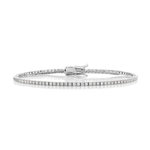 Introducing the Skinny Round Brilliant Diamond Tennis Bracelet—a refined piece showcasing a single row of round brilliant diamonds elegantly set in a slender white gold band with a secure clasp, beautifully displayed against a white background.