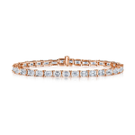 Introducing the East-West Emerald Cut Tennis Bracelet: a rose gold bracelet showcasing a single row of east-west set, emerald-cut clear stones in elegant prong settings, beautifully displayed on a white background.