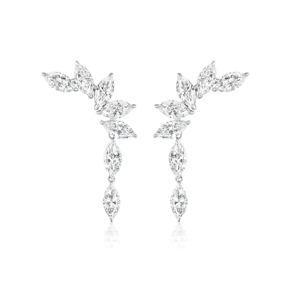 The Climbing Ivy Waterfall Earrings feature clusters of marquise diamonds arranged in a delicate leafy design, set in lustrous 18K white gold.