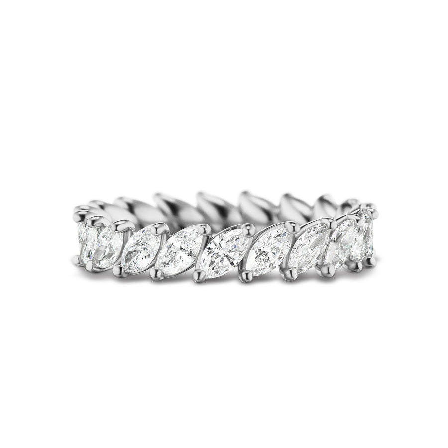 The Marching Marquise Eternity Band showcases a continuous row of marquise-cut diamonds in a modern, elegant setting—ideal as a bridal or celebration ring.