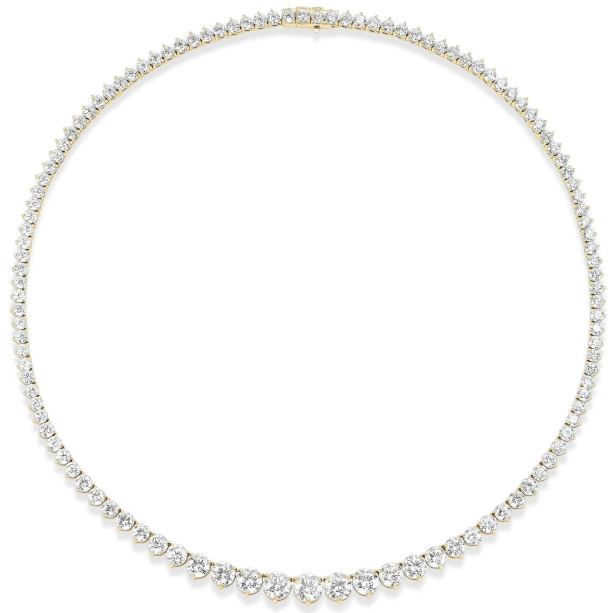 The Medium Graduated Round Diamond Tennis Necklace features diamonds set in 18k gold, with larger center stones and smaller diamonds graduating around the chain.