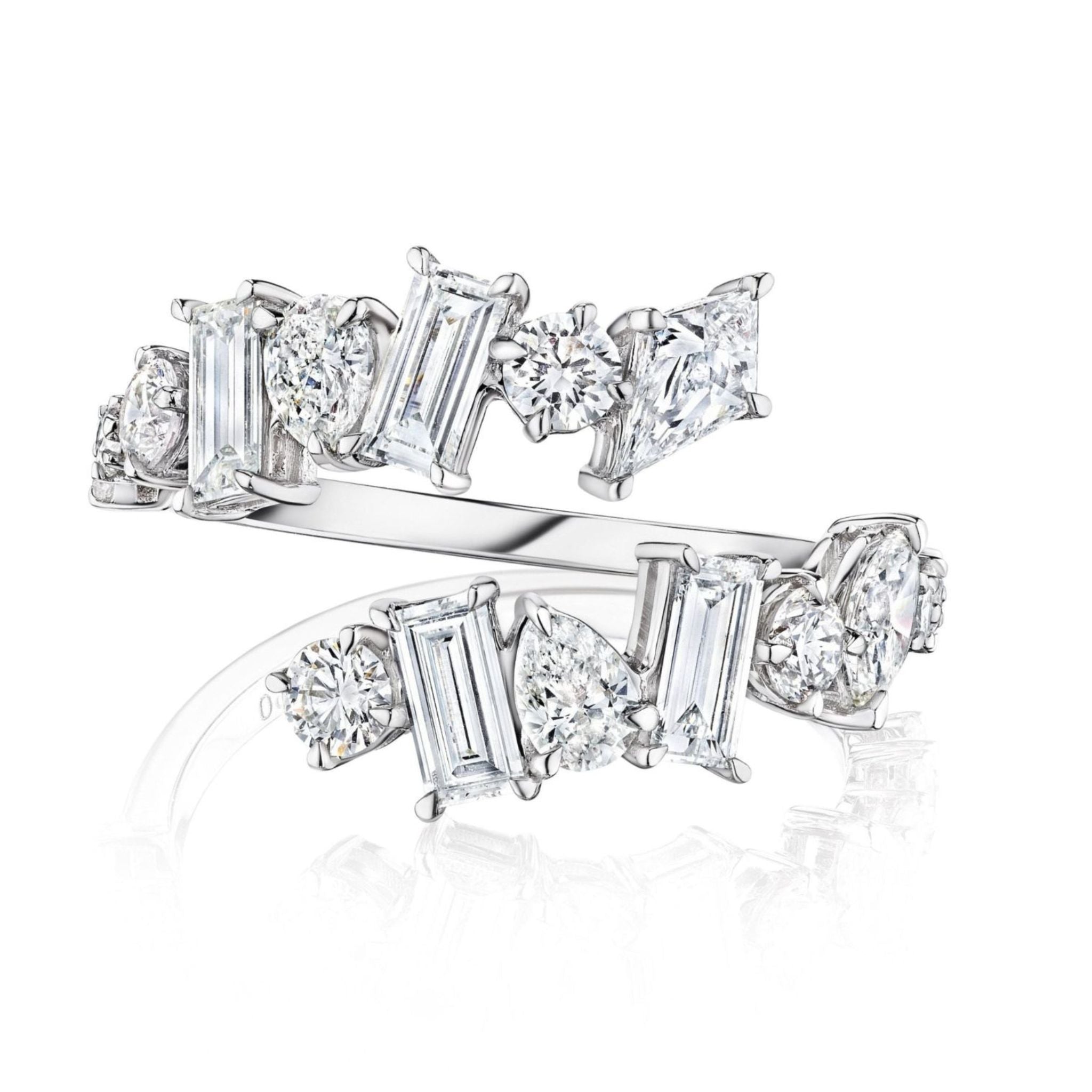 The Mixed Shape Kite Diamond Wraparound Ring in White Gold features round, pear, and baguette diamonds arranged in an alternating pattern for a modern, elegant look in 18K white gold.