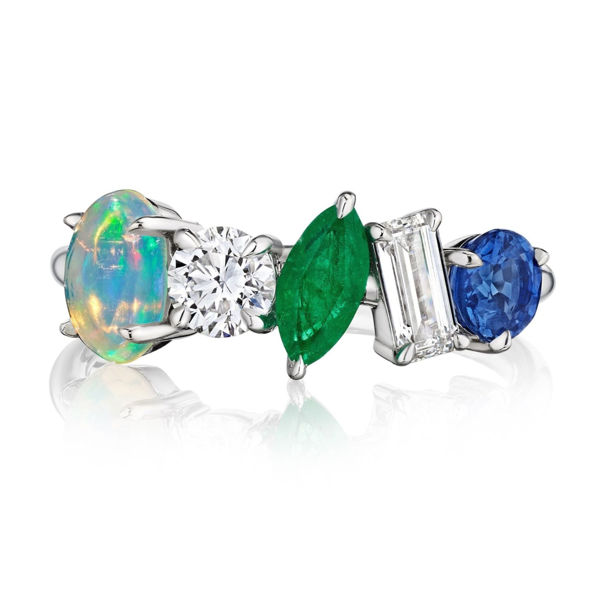The Mixed Shape Opal, Emerald, Diamond, and Sapphire Half-Eternity Band is a silver ring with five uniquely shaped gemstones—an oval opal, marquise emerald, round sapphire, and two diamonds—set side by side in a striking arrangement.