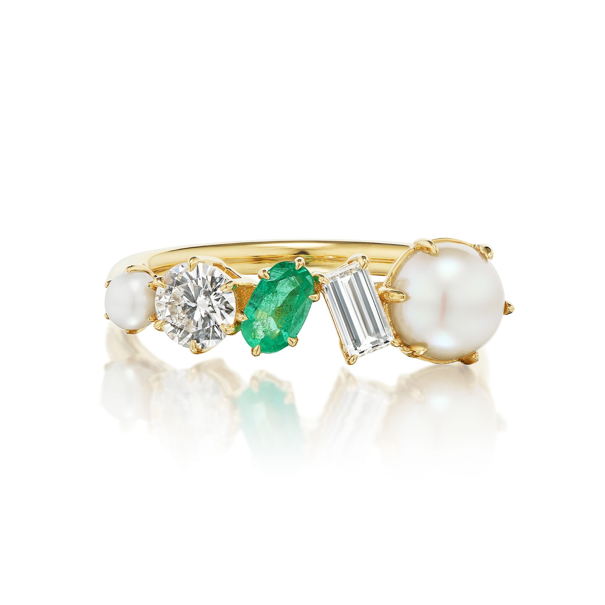 The Mixed Shape Pearl, Diamond and Emerald Half-Eternity Band is a gold celebration ring set side by side with a pearl, round diamond, green emerald, rectangular-cut diamond, and a larger round pearl of varying sizes.