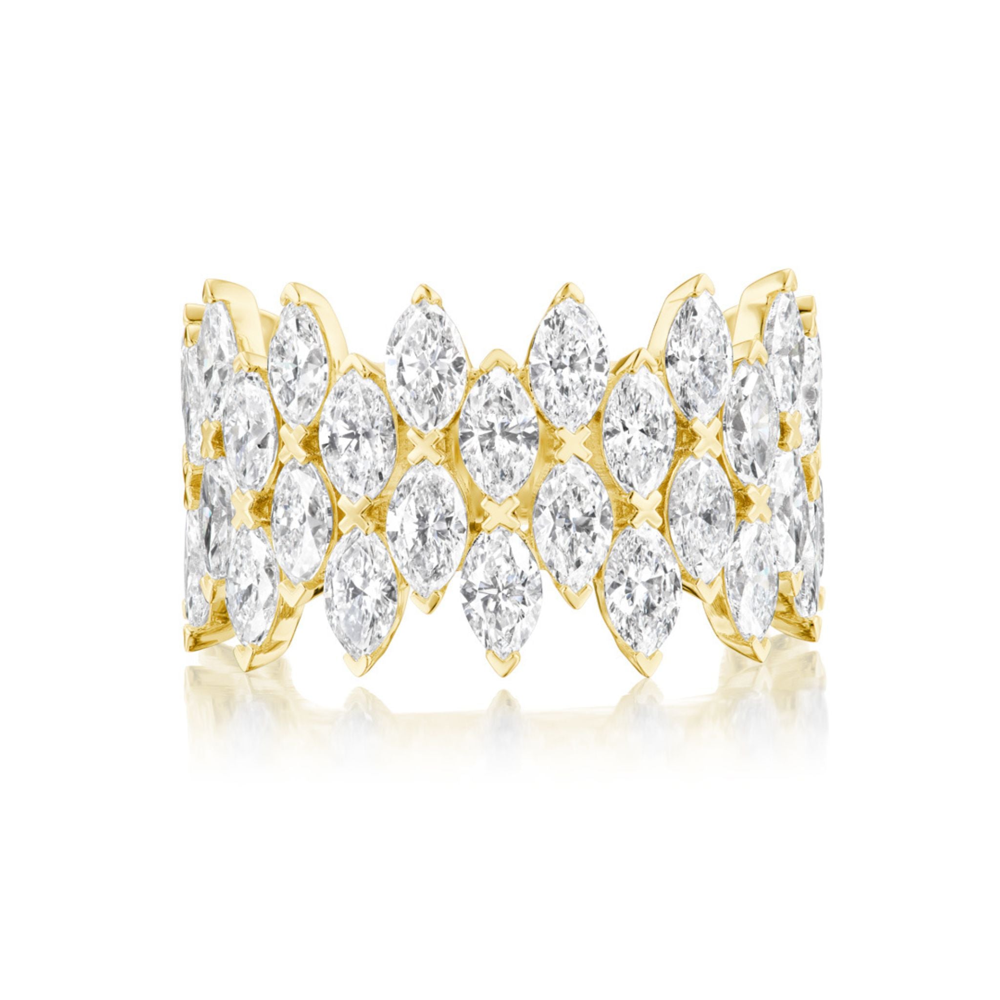 The Multi Tier Marquise Diamond Eternity Band showcases three rows of closely set SI clarity marquise-cut white diamonds in 18k gold, creating a sparkling and luxurious look.