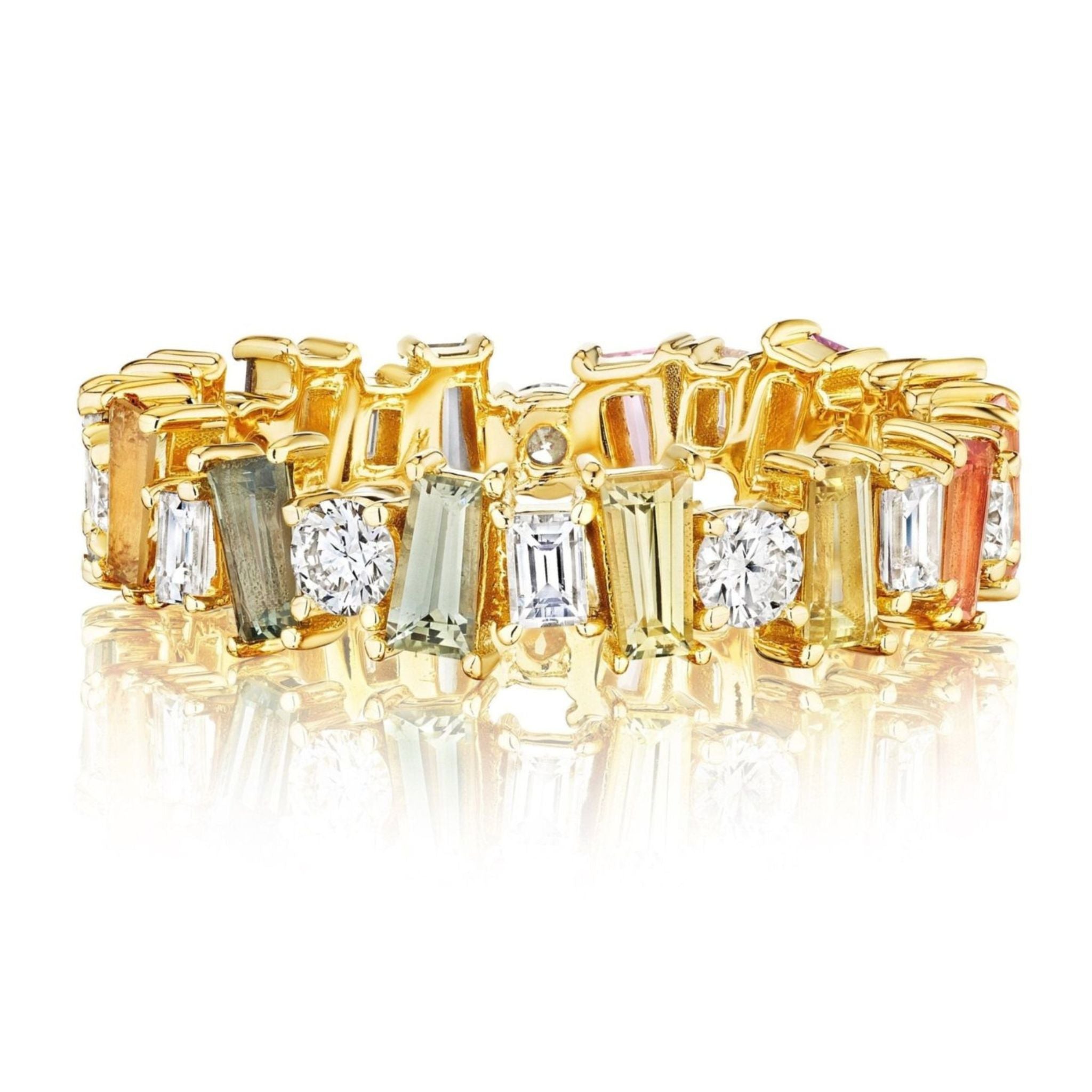 The Multicolor Eternity Band in Yellow Gold features round diamonds and tapered baguette sapphires in an intricate, clustered design with clear, green, yellow, and pink gemstones.
