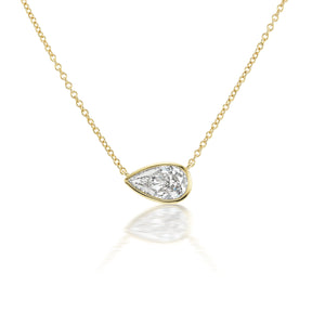 East-West Bezel Set Pear Diamond Pendant in Yellow Gold