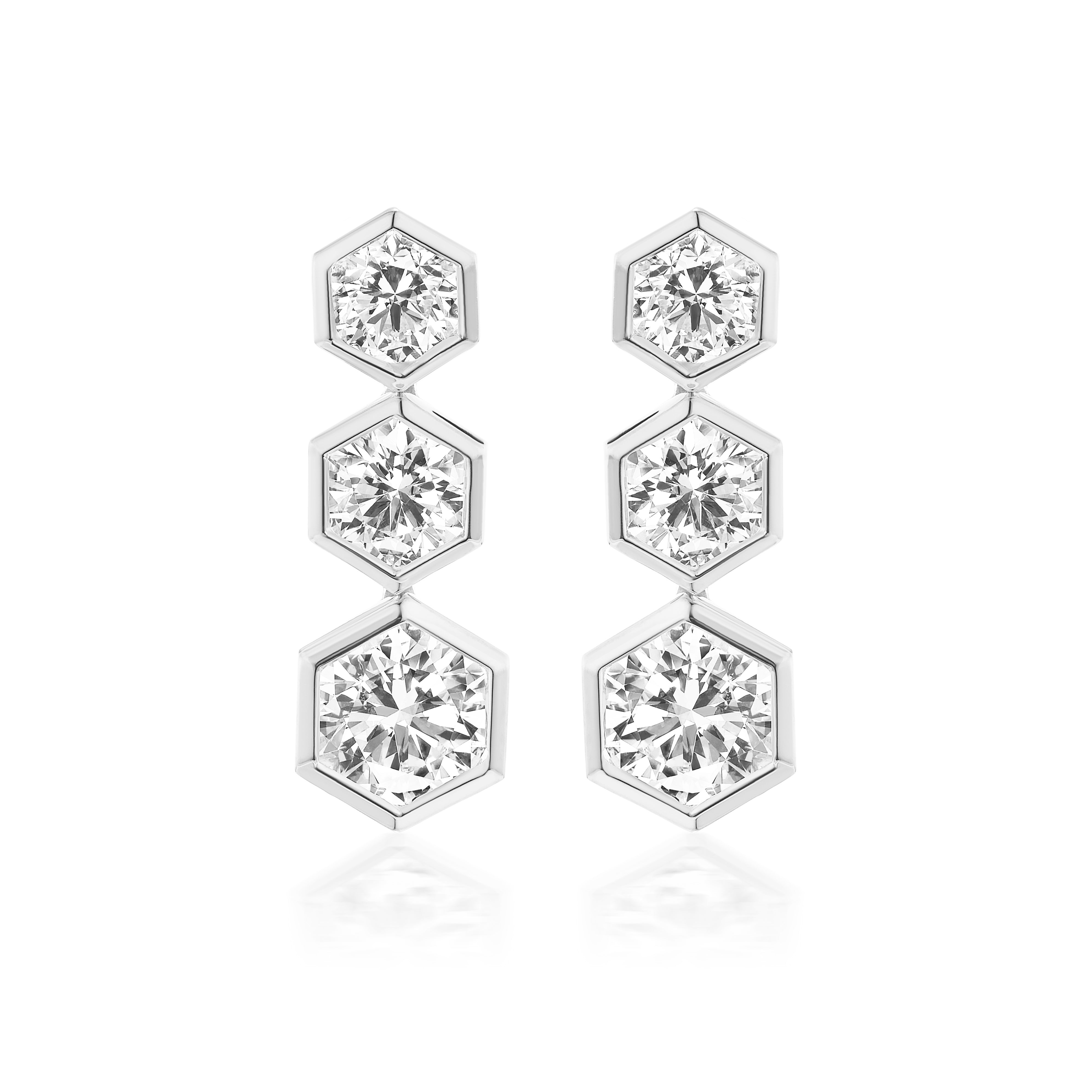 Graduated Hexagon Bezel Set Drop Earrings with Round Brilliant Diamonds, featuring three connected hexagonal settings each holding a sparkling round diamond, shown on a white background.