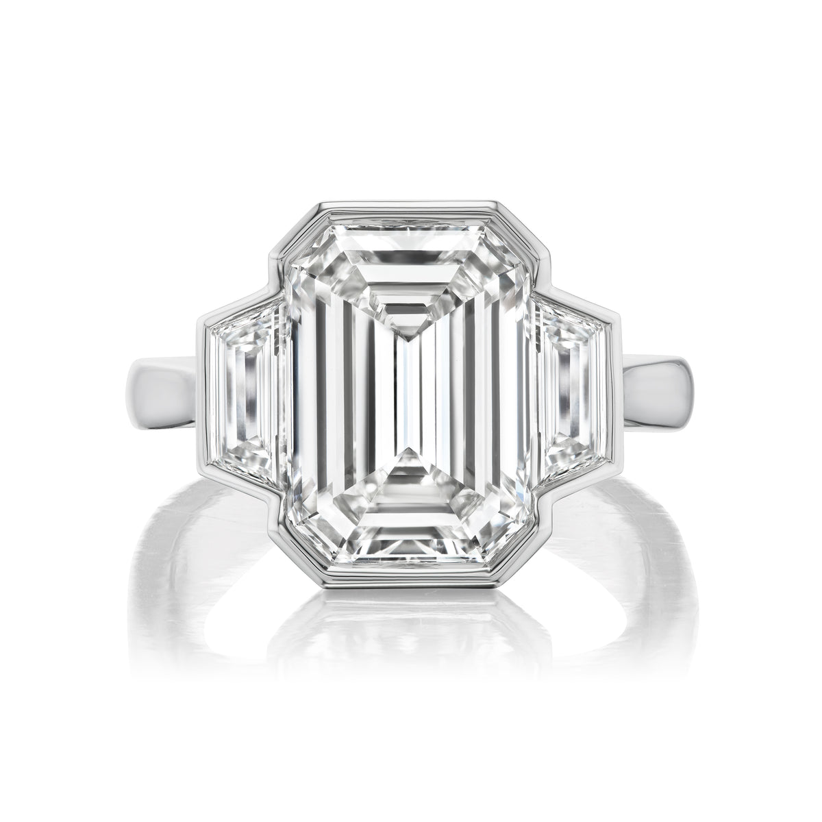 Emerald Cut Diamond Engagement Ring with Bezel Setting and Trapezoid Side Stones