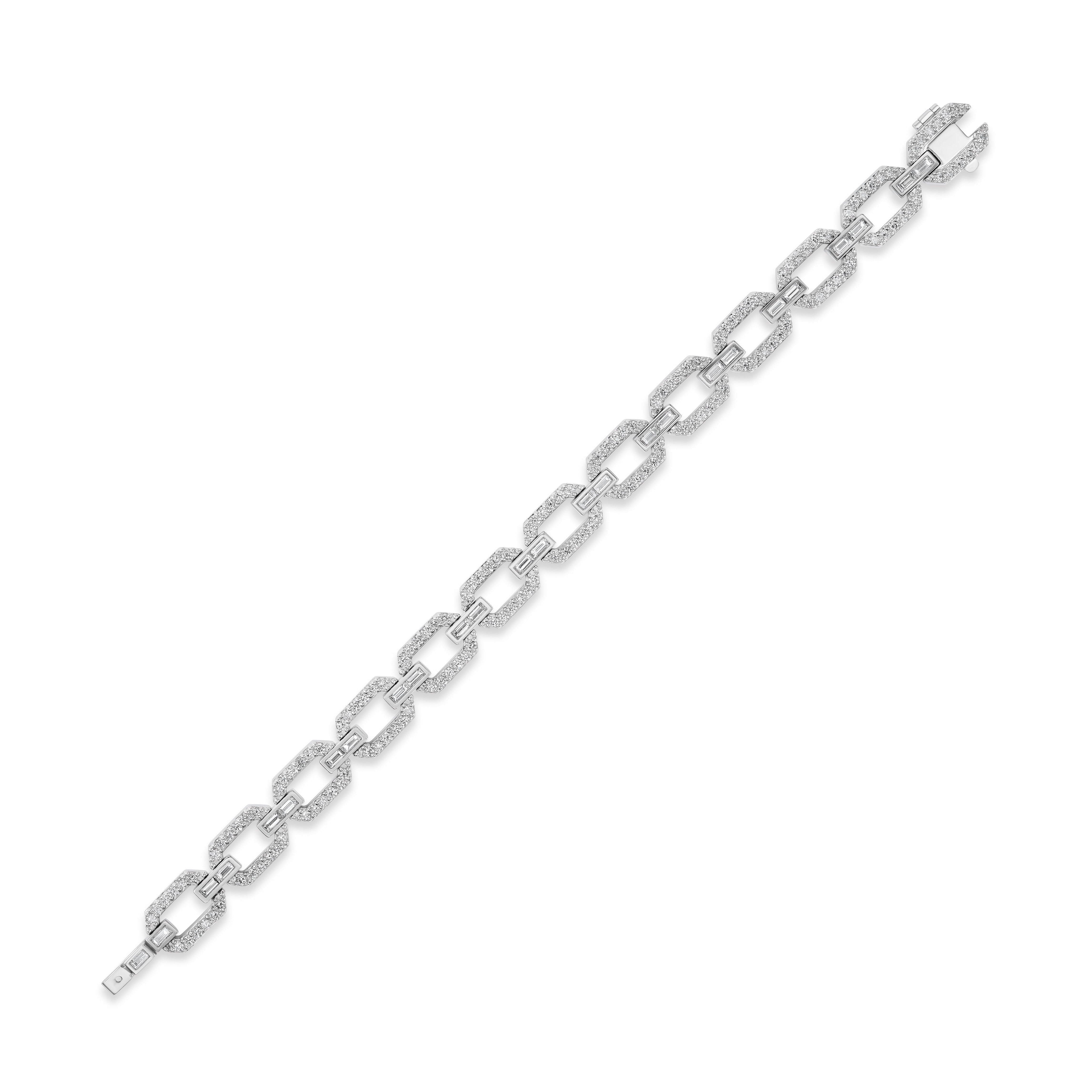 The Bezel Set Baguette Diamond Pavé Chain Bracelet in White Gold is a 6.5" piece featuring rectangular links and sparkling baguette diamonds, crafted in elegant 18K white gold and shown against a white background.