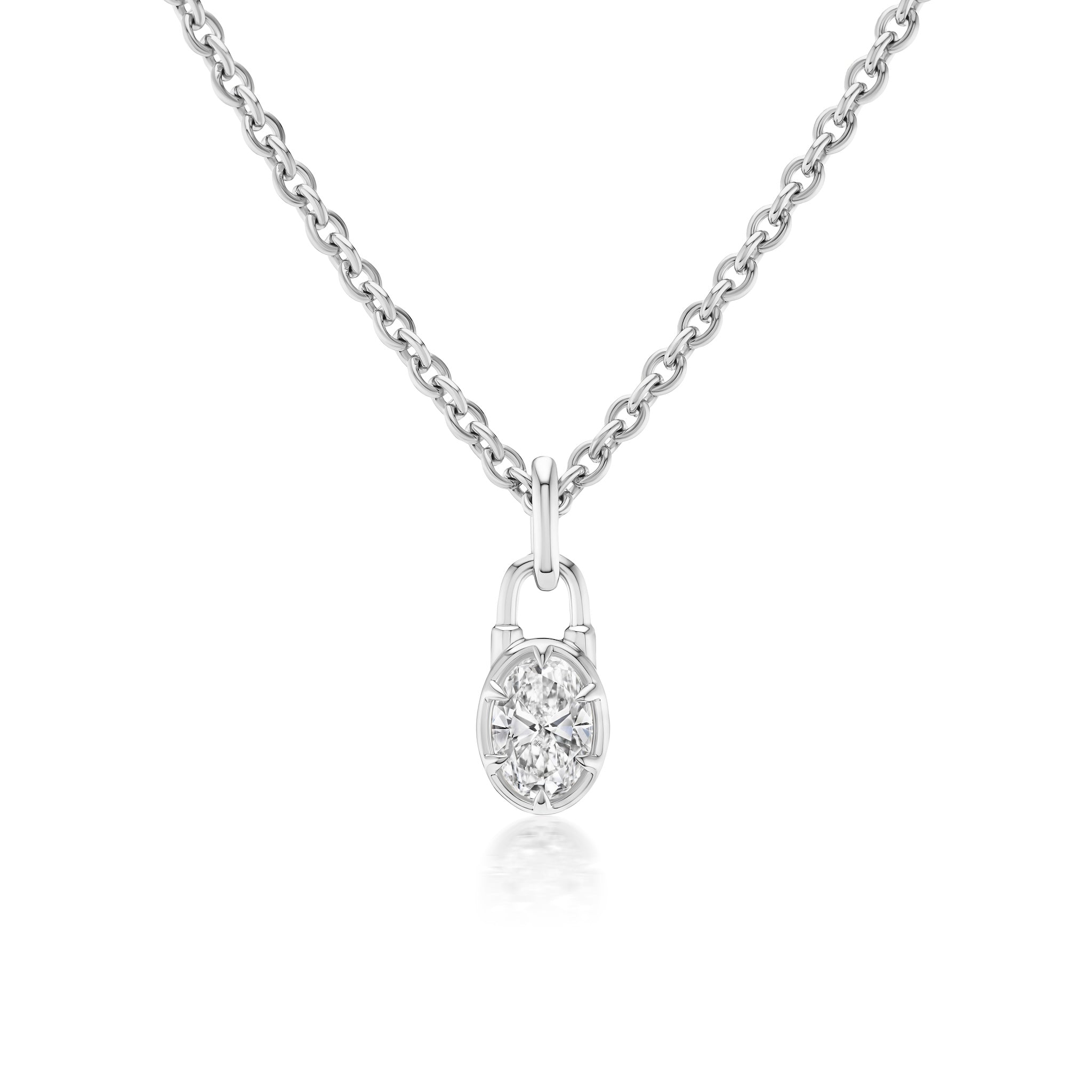 The Locket Motif Diamond Pendant Necklace features a delicate silver chain and a small locket design with a sparkling round diamond at its center.