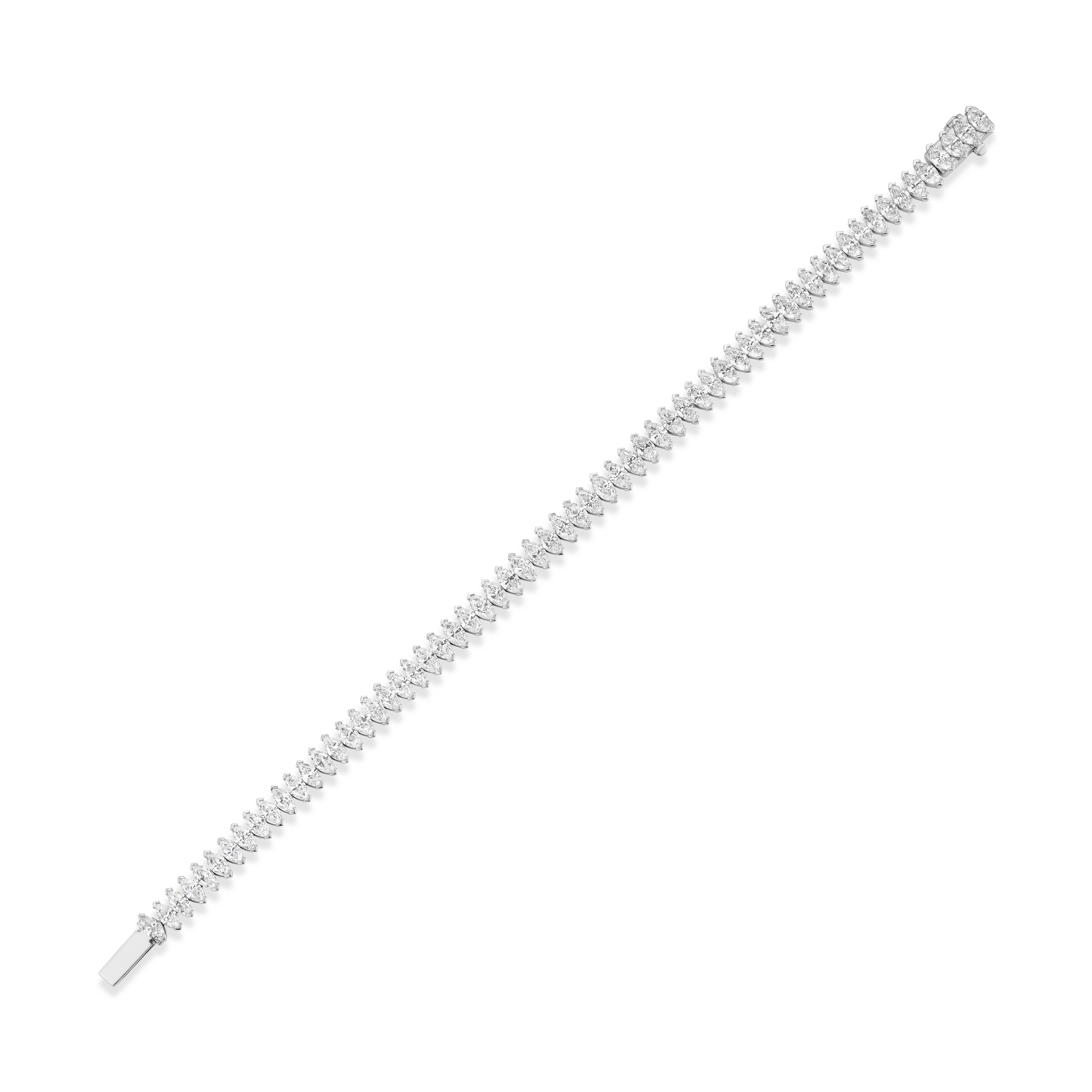 The North-South Set Diamond Marquise Tennis Bracelet in White Gold showcases a single row of sparkling SI clarity round diamonds on a slim 18k white gold band with a clasp closure, shown against a white background.
