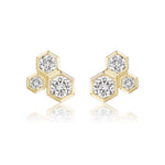 Hexagon Bezel Set Round Diamond Trio Studs in 18k gold with a honeycomb design, each hexagonal stud featuring three sparkling bezel-set diamonds. Displayed on a white background.