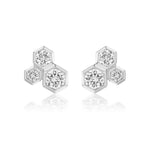 Hexagon Bezel Set Round Diamond Trio Studs feature three hexagonal shapes with sparkling round diamonds in a clustered, honeycomb-inspired design against a white background.