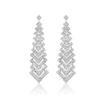 Art Deco Statement Earrings in 18k white gold, featuring layered chevron patterns with round and baguette diamonds, displayed on a white background.