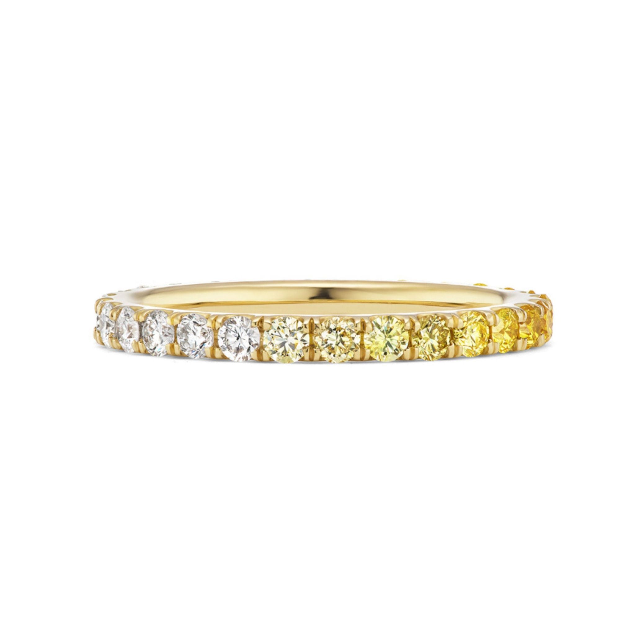The Ombré Eternity Band features radiant cut yellow sapphires and white diamonds in a stunning gradient, making it the perfect celebration ring for any special moment.