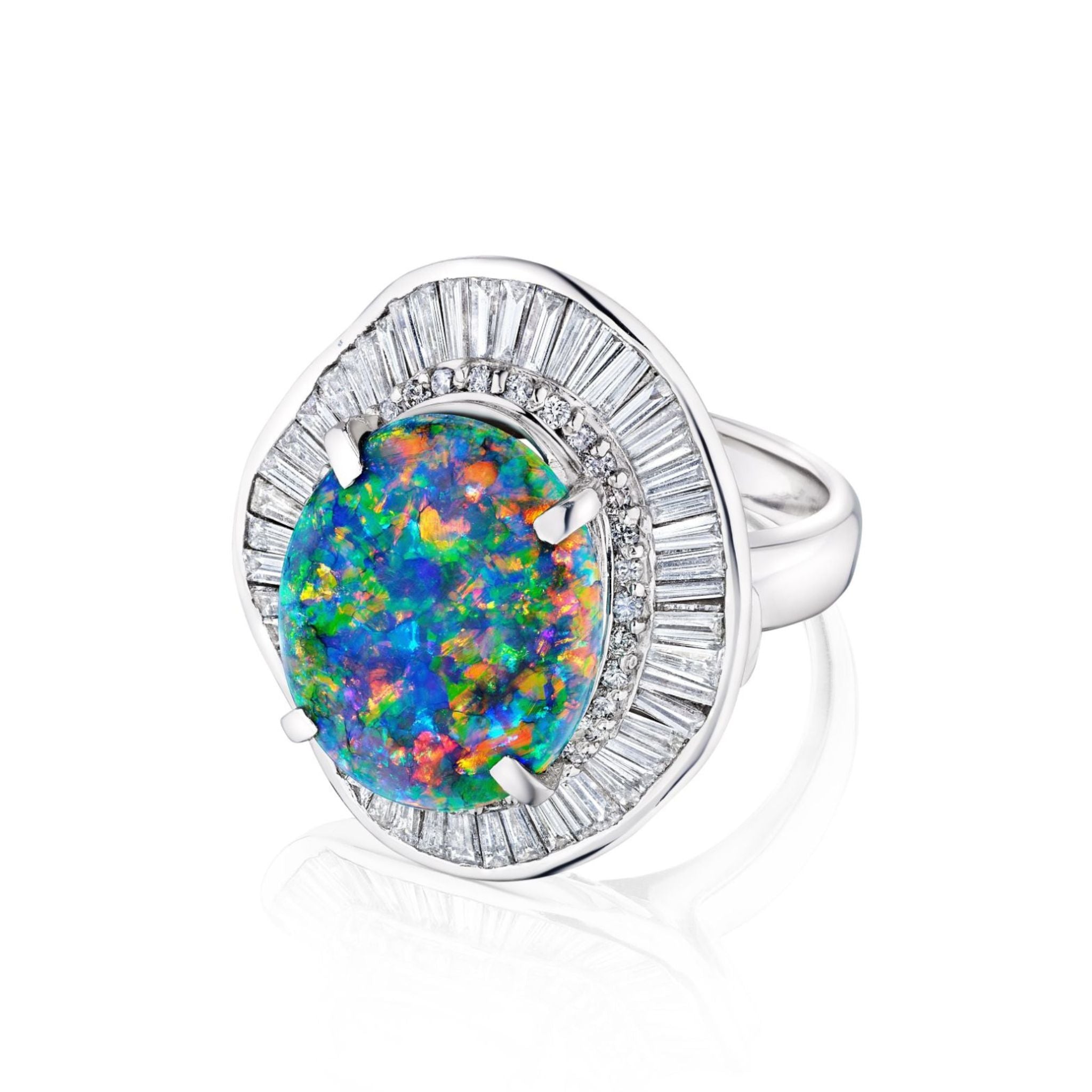The Opal and Diamond Ring features a large round opal with vivid blue, green, and orange hues set in platinum, accented by two layers of sparkling baguette diamonds in various cuts.