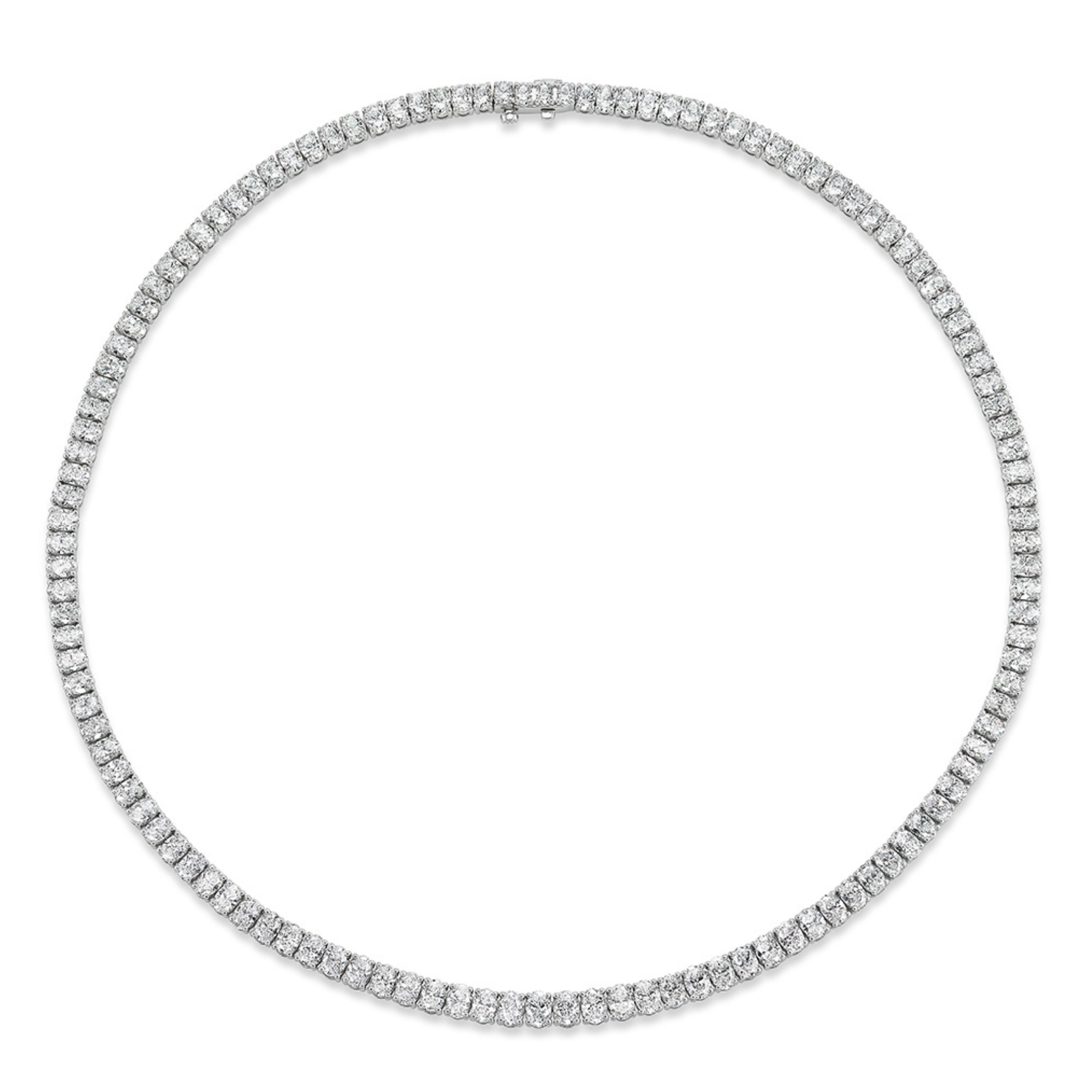 The Oval Diamond Tennis Necklace in White Gold features a continuous line of oval diamonds set in elegant 18K white gold for a timeless look.