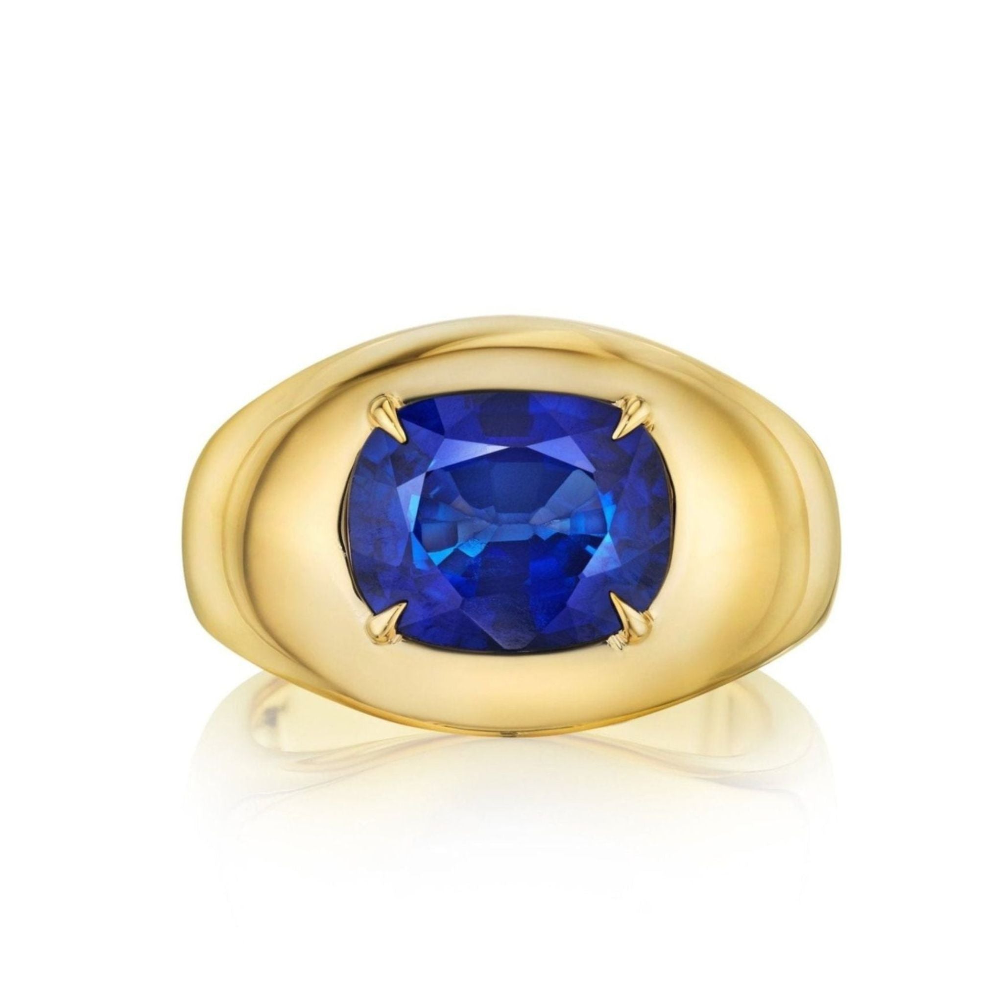 The Oval Gemstone Bombé Ring in Yellow Gold from the Chroma collection features a striking blue sapphire set in 18K yellow gold, showcased against a white background.