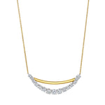 The Coil Bar Pendant with Graduated Round Diamonds in Yellow Gold and Platinum features a graceful yellow gold bar above a row of sparkling diamonds, elegantly arranged for a sophisticated look.