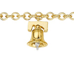 The America250 Ruby, Pearl, Sapphire, and Diamond Charm Bracelet in yellow gold features colorful gems and celebrates history with elegant craftsmanship.