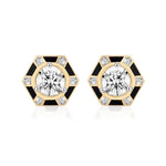 Hexagon Alternating Onyx and Diamond Ear Jackets in 18k yellow gold feature hexagonal studs accented with black enamel, onyx details, and a central round white gemstone surrounded by six rectangular baguette-cut diamonds, displayed on a white background.