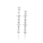 A pair of Mixed Shape Tennis Ear Jackets elegantly crafted in 18k white gold, featuring geometric and round gemstones arranged vertically, with a missing gem in one earring for a unique twist.