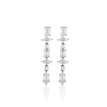 Introducing the Mixed Shape Tennis Ear Jackets: long, dangling earrings crafted in 18k white gold and featuring a striking vertical arrangement of clear, geometric gemstones in rectangular, square, and oval shapes. Reminiscent of modern diamond statement earrings, these elegant pieces are artfully displayed against a plain white background.