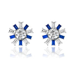 Confetti Ear Jackets in White Gold featuring central emerald cut diamonds, surrounded by alternating blue sapphires and clear emerald cut diamonds in a striking starburst pattern, set in gleaming 18k white gold.