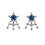America250 Baguette Diamond Ear Jackets in Black Rhodium feature star-shaped designs with blue gemstone centers, surrounded by sparkling clear stones, and three rectangular dangling clear stones beneath each star, all elegantly set in silver metal with a luxurious black rhodium plated platinum finish.