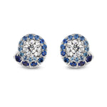 Ombré Swirl Ear Jackets in White Gold feature large central clear stones encircled by a spiral of multicolor sapphires in various sizes. Custom order options are available.