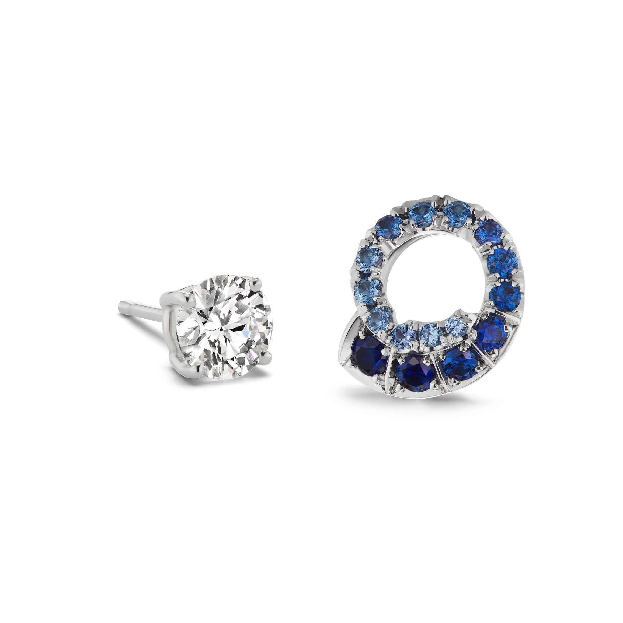 Ombré Swirl Ear Jackets in White Gold with Multicolor Sapphires: a striking pair featuring one round white gemstone stud and a circular open hoop adorned with an ombré swirl of multicolor sapphires, including brilliant blue stones in a stunning gradient. Custom order options available.