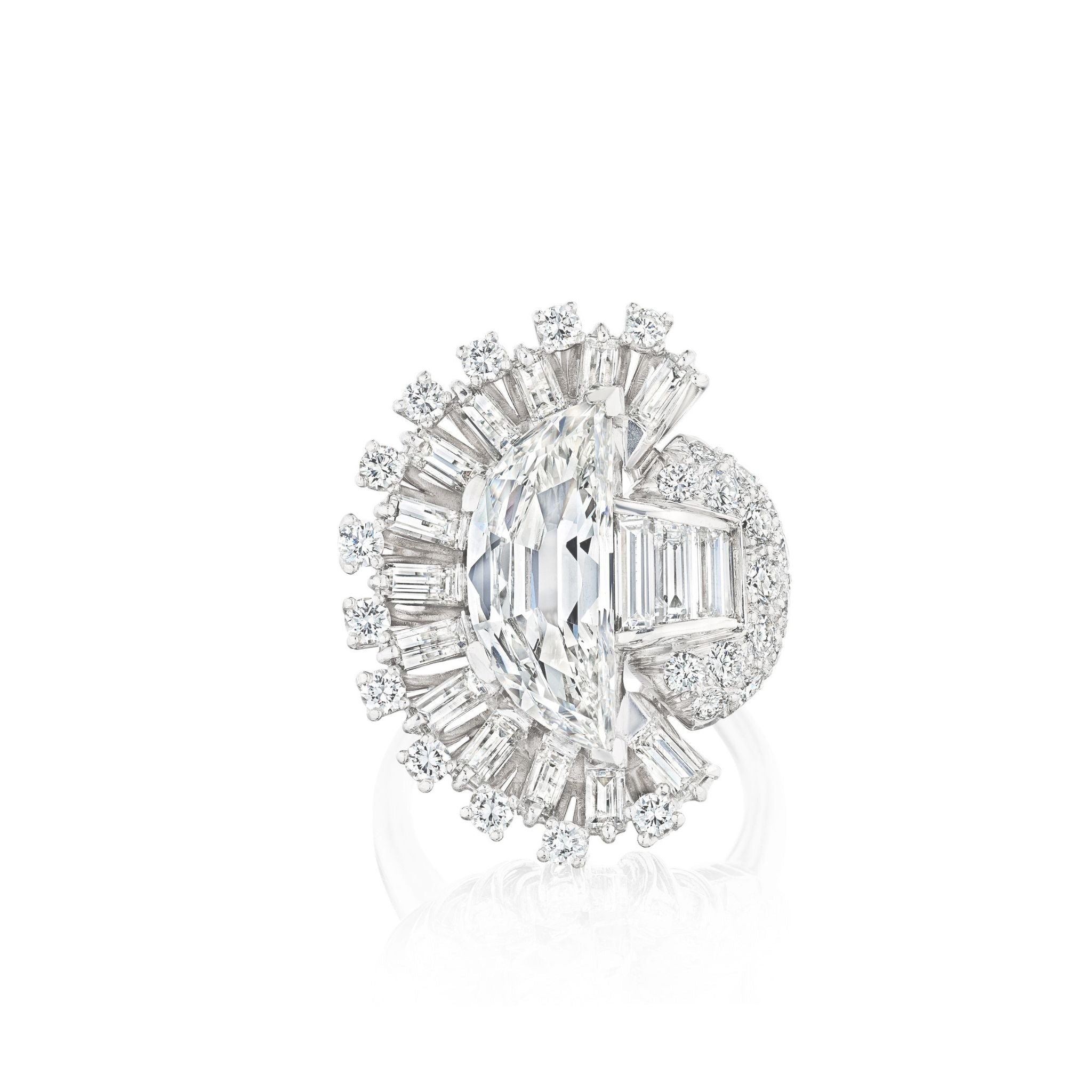 The Vintage Oscar Heyman & Brothers Diamond Ring showcases a striking marquise-cut center diamond, accented by half-moon diamonds and an array of baguette and round diamonds in an elaborate fan-shaped halo, all set on a platinum band from 1946.
