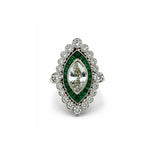 The Art Deco Emerald Diamond Ring, featuring a marquise diamond surrounded by a double halo of green emeralds and round diamonds set in sleek platinum, evokes the timeless elegance of vintage milgrain jewelry and is beautifully displayed against a white background.