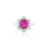Presenting the Vintage Oscar Heyman & Brothers Pink Sapphire and Diamond Ring—crafted in silver, this exquisite piece showcases a vibrant round Ceylon pink sapphire at its center, beautifully encircled by a floral motif of sparkling white diamonds for timeless elegance and charm.
