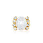 The Cultured Pearl and Diamond Ring showcases a dazzling 18K gold band adorned with a prominent oval-shaped baroque cultured pearl at its center, elegantly accented by six round diamonds on each side.