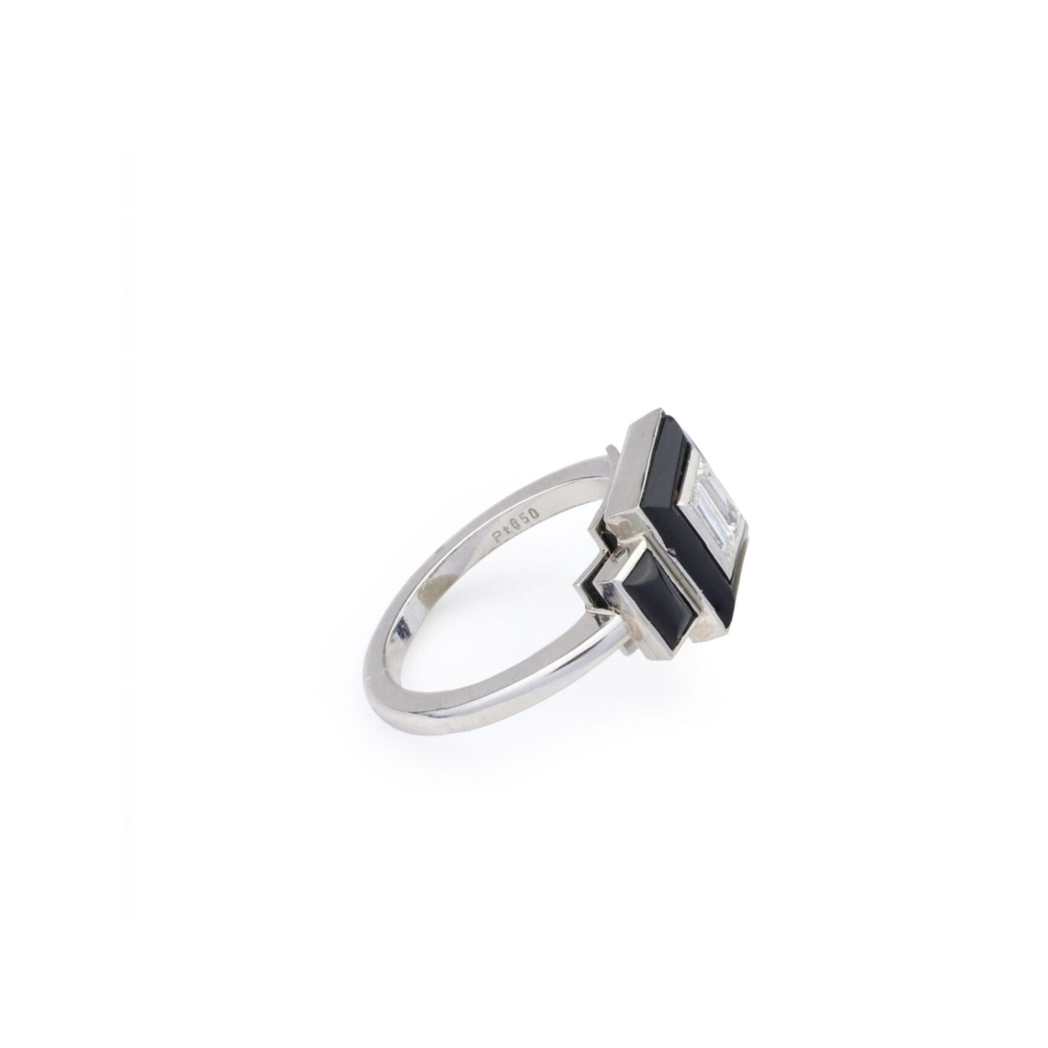Vintage Onyx and Diamond Ring in platinum, size 6, featuring a rectangular clear diamond accented with black geometric onyx inlays, displayed from a side angle against a white background.