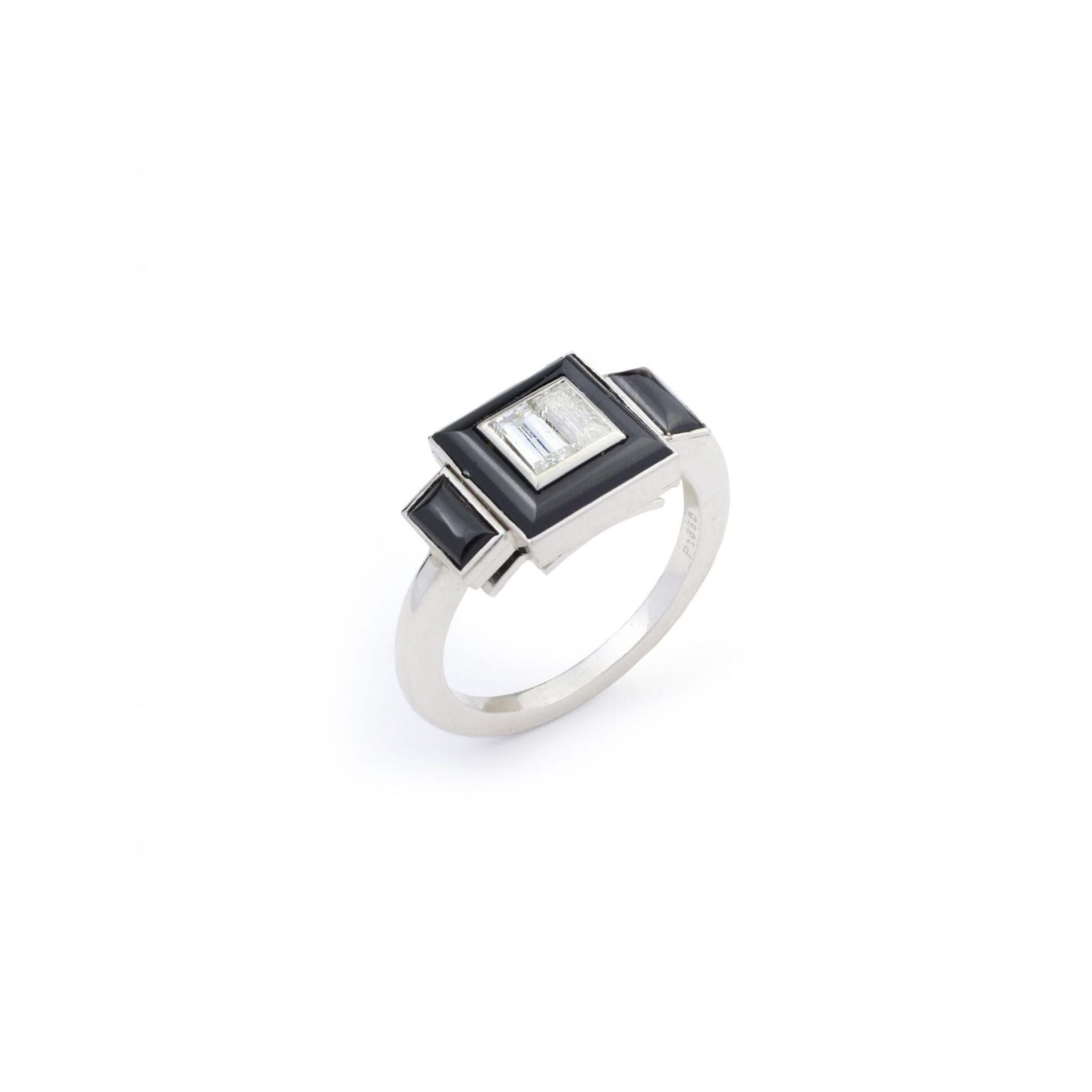 The Vintage Onyx and Diamond Ring showcases a central rectangular clear diamond, framed by onyx with black geometric accents, all set on a platinum band against a plain white background.