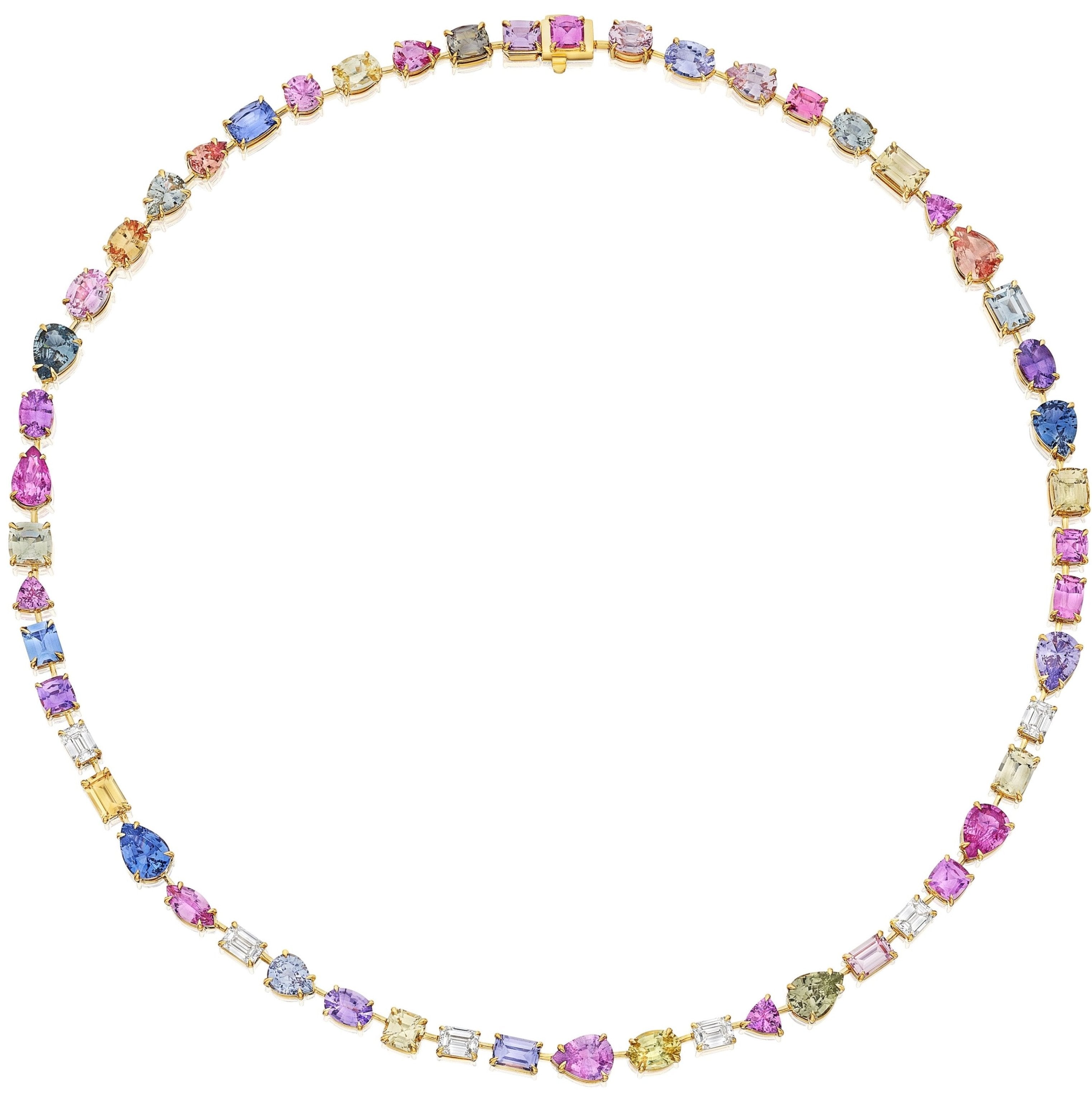 The Chroma Kaleidoscope Mixed Shape Sapphire and Diamond Tennis Necklace in Yellow Gold features round, oval, rectangular, and square sapphires spaced along the chain for a vibrant multicolored effect.