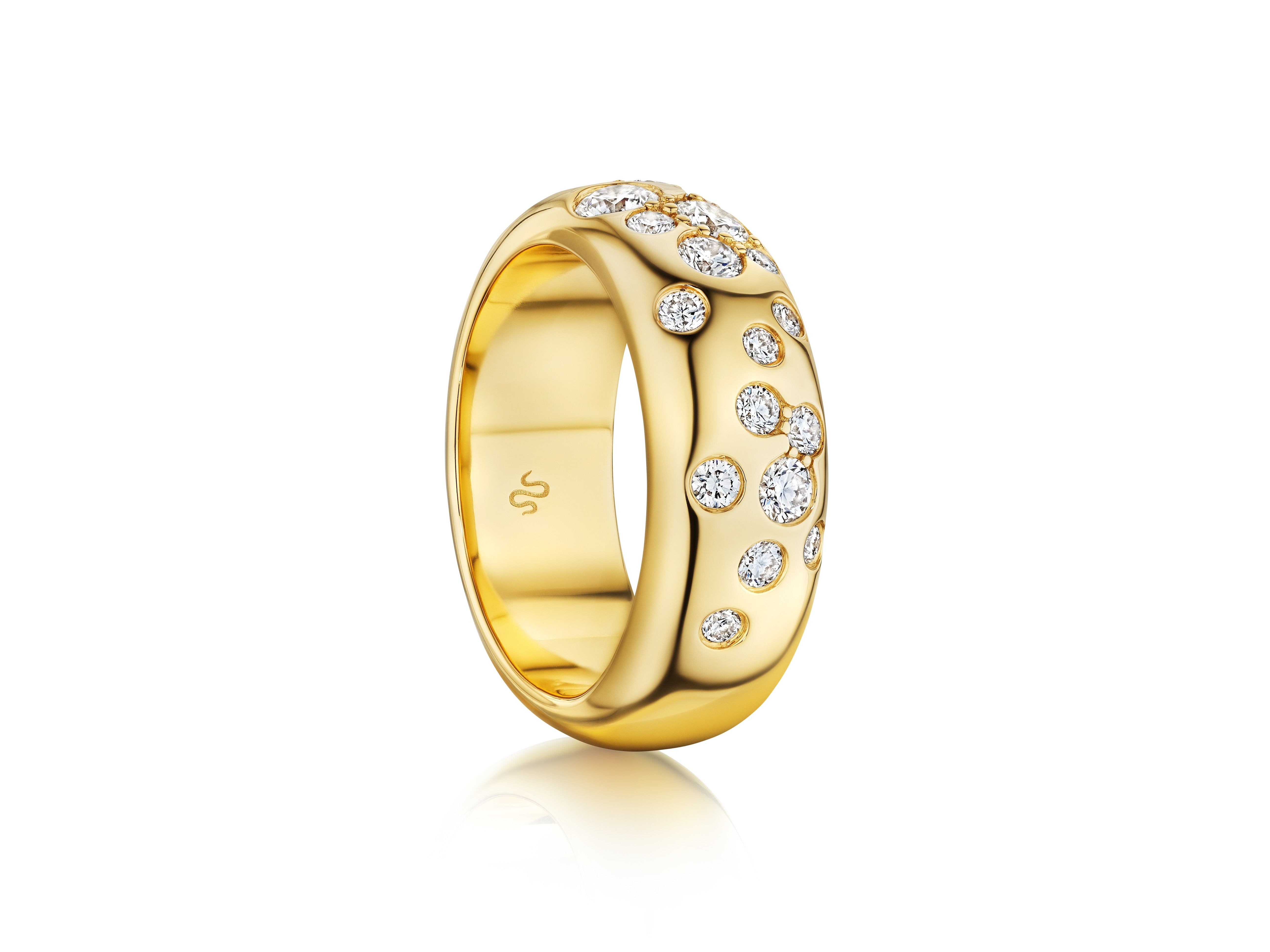 The Cluster Cigar Band features burnish set round brilliant diamonds on a polished 18K yellow gold ring, shown against a white background.