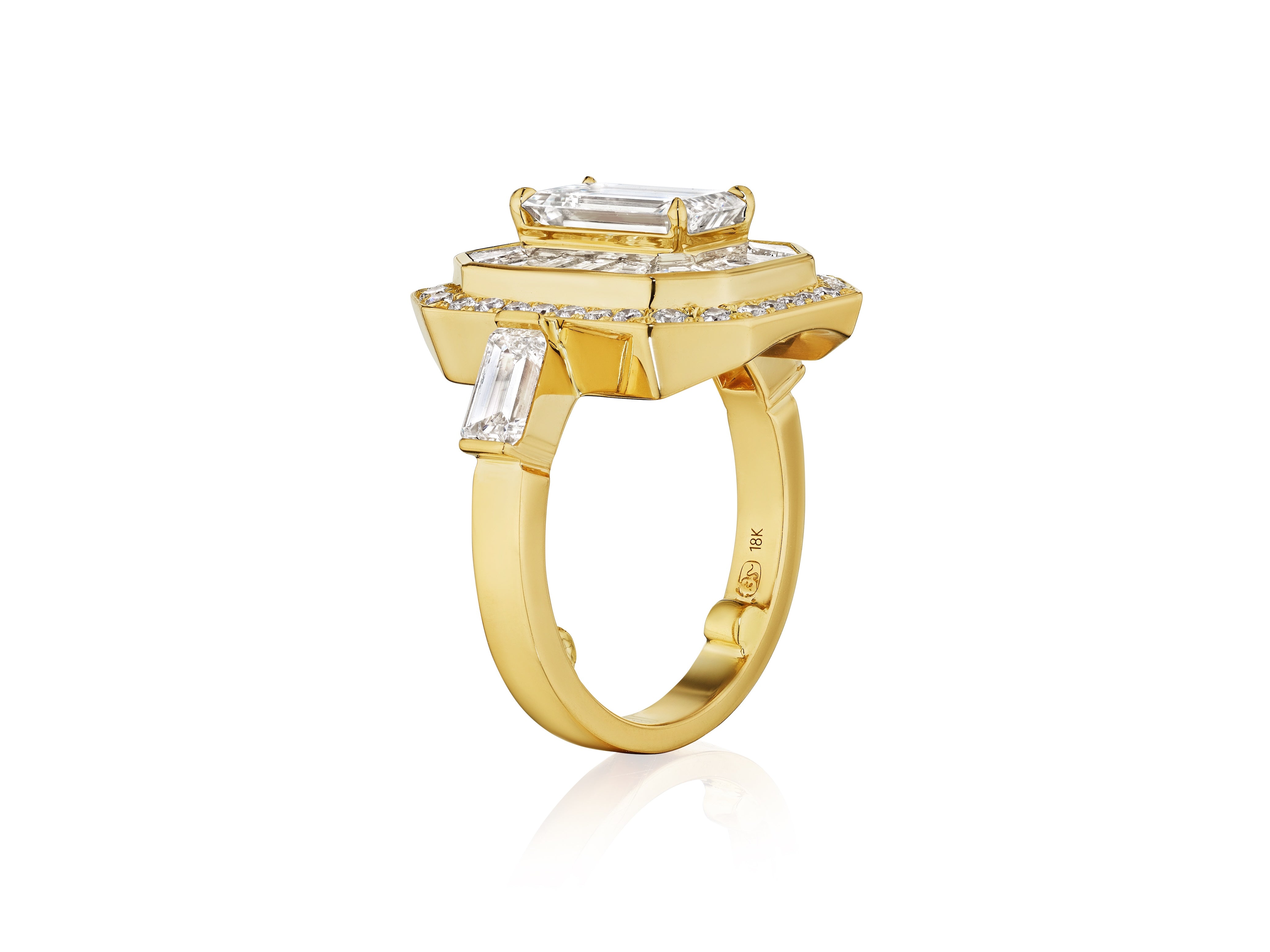 The Bespoke Mosaic Statement Double Halo Set Ring in yellow gold features a rectangular central diamond with mixed shape and baguette-cut accents, making a bold statement on a white background.