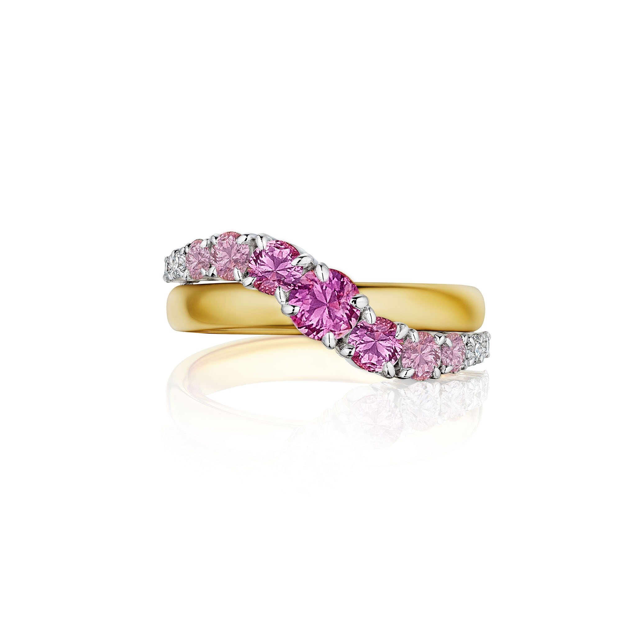 The Pink Coil Graduated Round Sapphire and Diamond Wave Band in Yellow Gold features a twisted band design crafted in 18k yellow gold, with a diagonal row of pink sapphires and white diamonds set across the top, displayed on a white background.