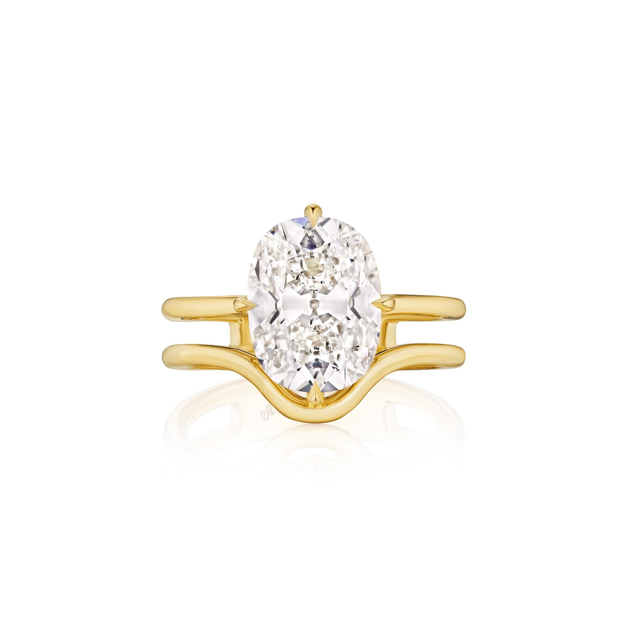 The Double Band North-South Prong Set Cushion Cut Diamond Engagement Ring in Yellow Gold features a cushion-cut diamond in a contemporary double band design, showcased against a white background.