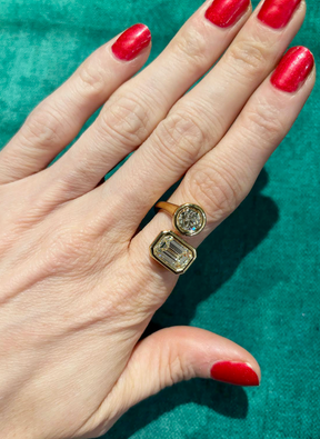 Toi Et Moi Wraparound Ring Bezel Set in Yellow Gold with Round and Emerald Cut Diamonds