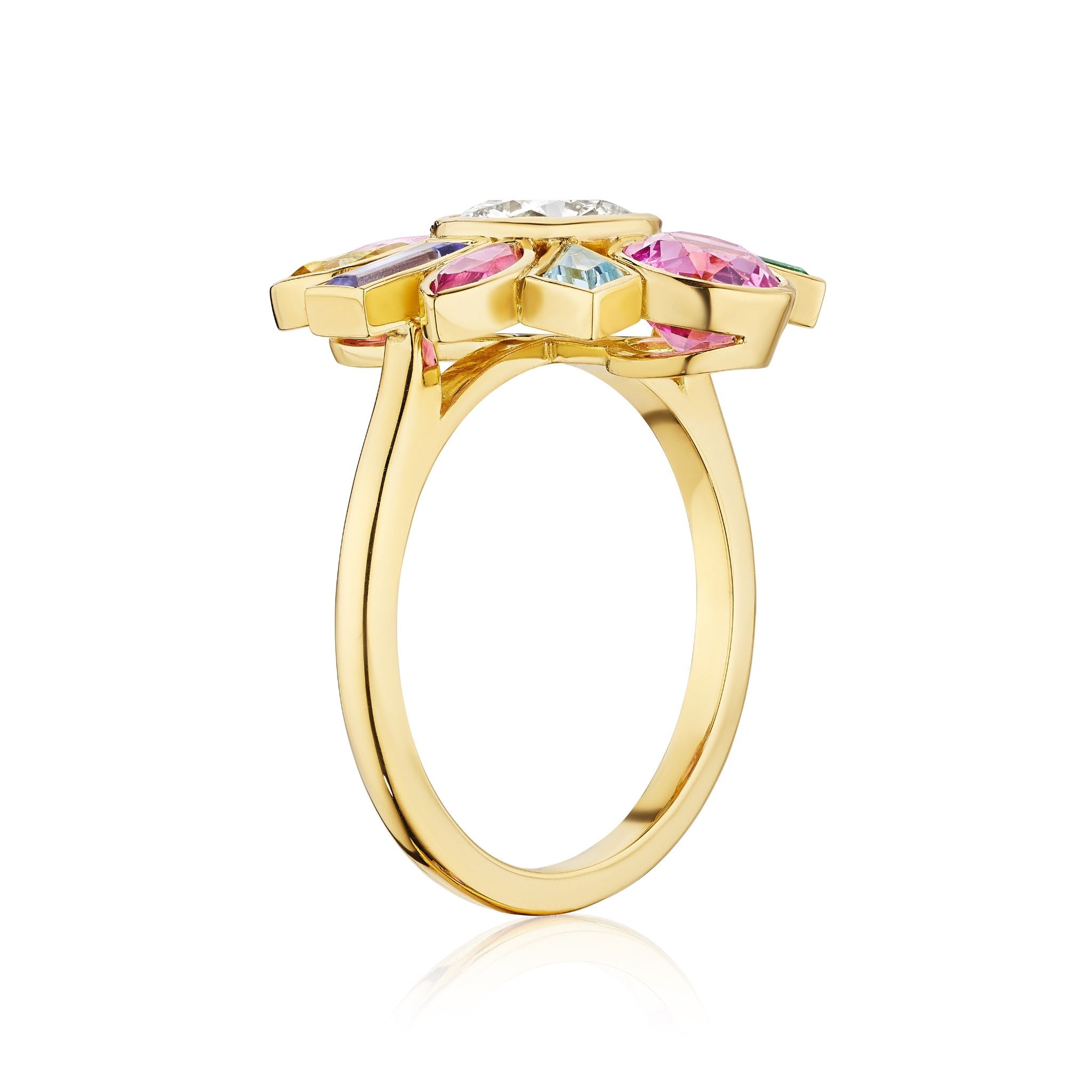 The Bezel Set Bespoke Round Brilliant Diamond and Sapphire Multi Color Ring in Yellow Gold features a thin band and vibrant gemstones arranged in a floral pattern, showcased against a white background.