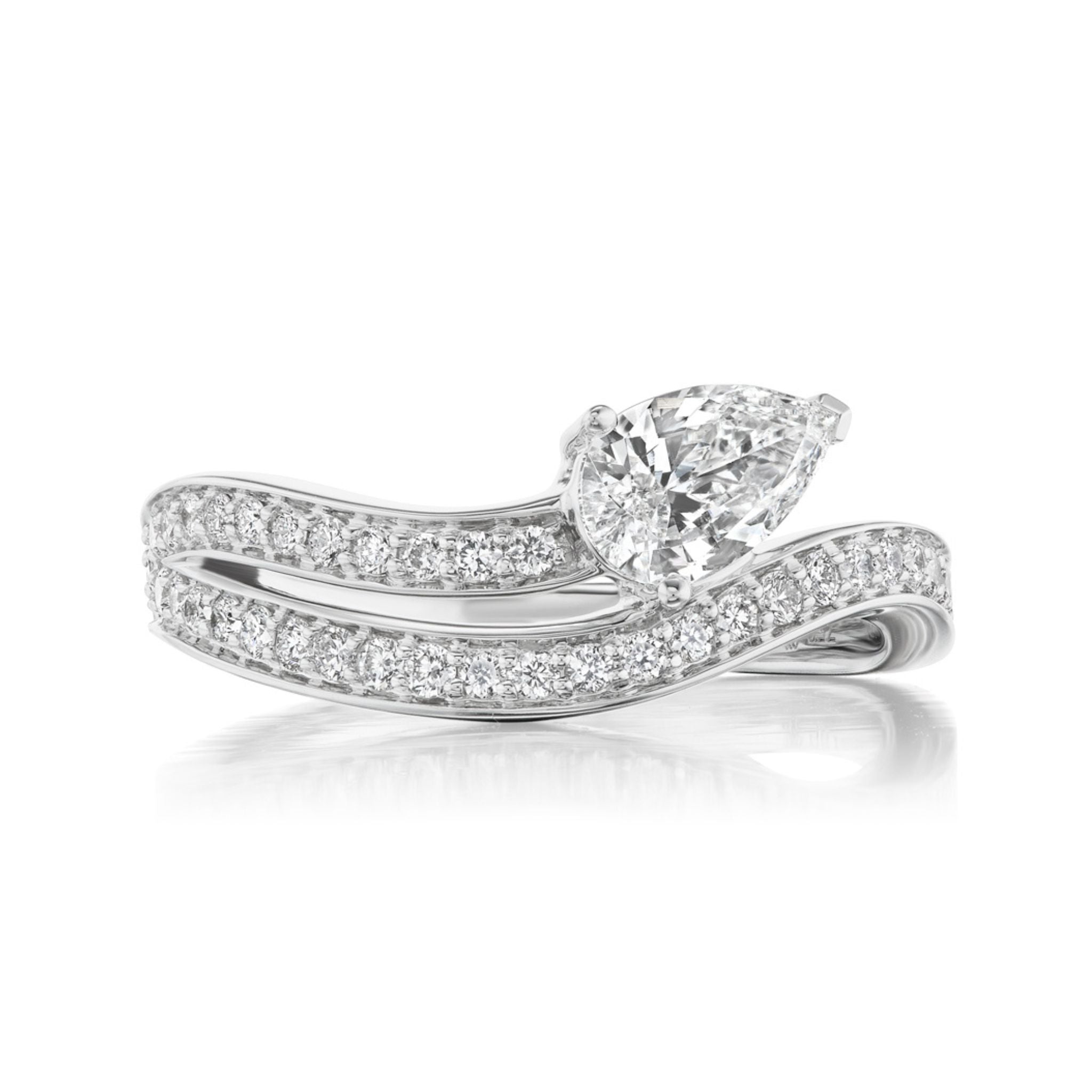 The Serpent Wraparound Ring features a pear shape and round diamonds set in 18K white gold, with wavy pavé-set bands that curve elegantly for a modern, sophisticated look.