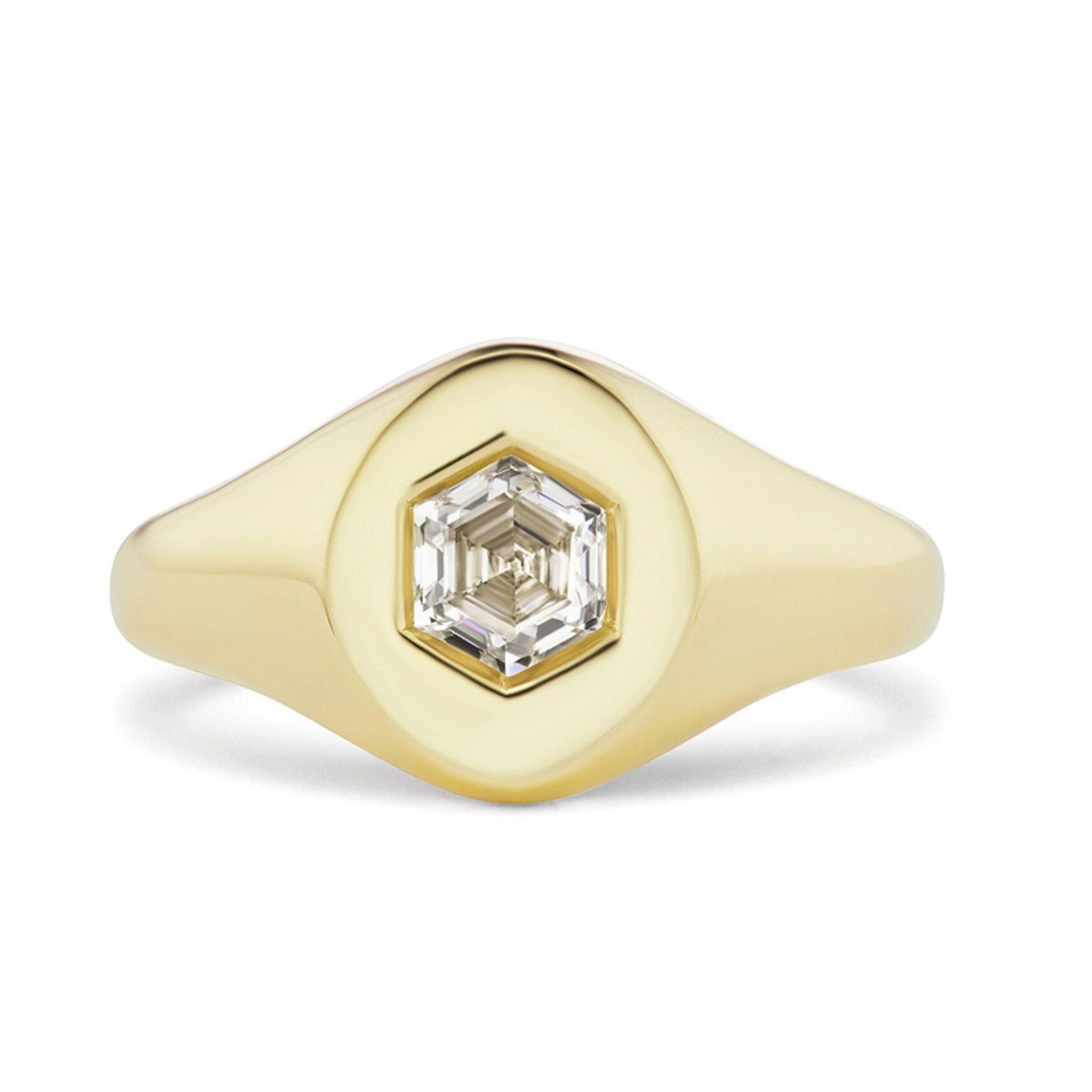 The Signet Ring with Hexagon Diamond features a bezel-set hexagonal diamond at its center, complemented by a smooth, polished band and a sleek, minimalist design.