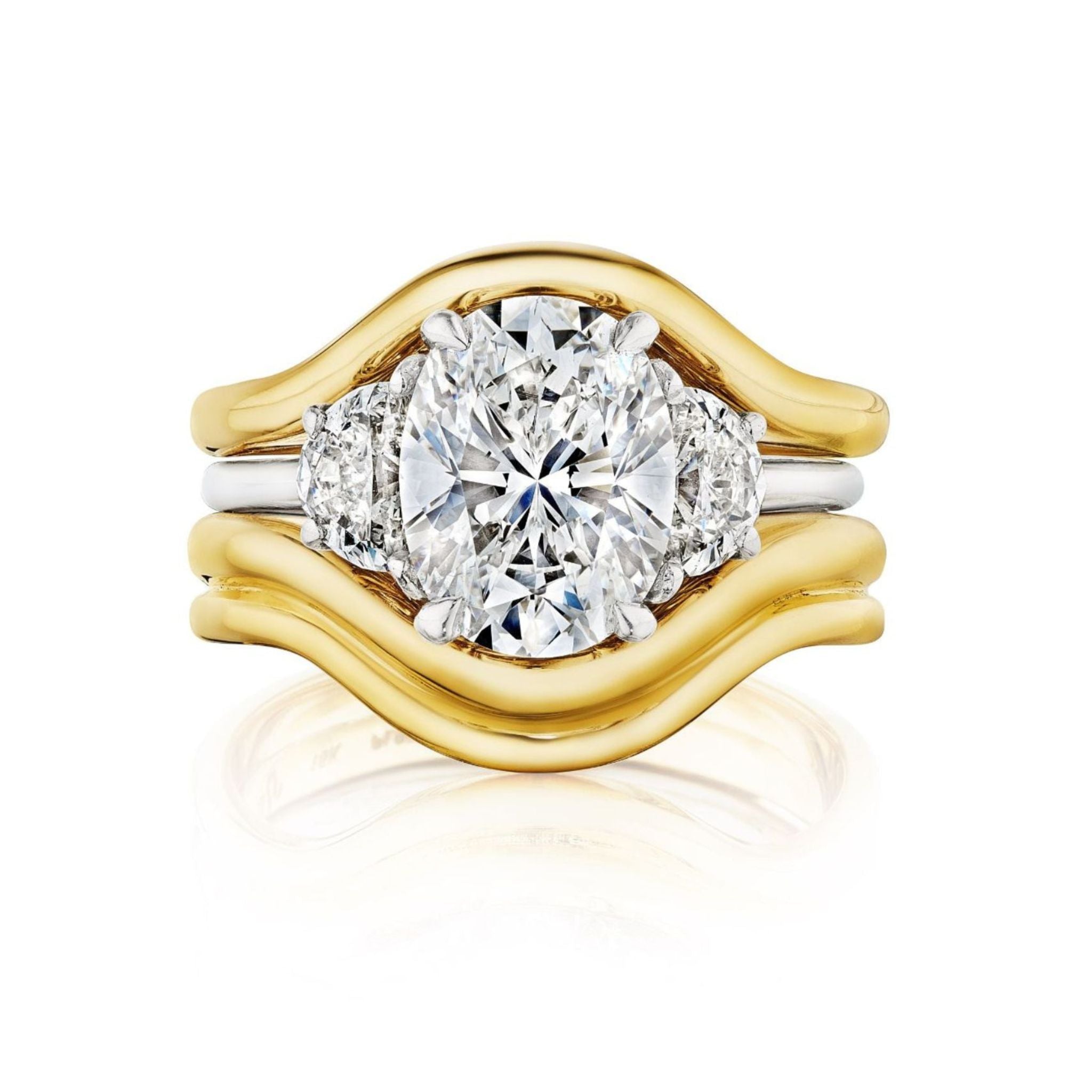 The Single and Double Band Contour Ring Jacket in Yellow Gold features wavy 18k gold bands designed to frame your center ring, enhancing its silhouette with a sleek gold and silver accent.